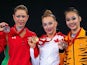 Medallists Patricia Bezzoubenko (Canada), Francesca Jones (Wales) and Poh San Wong (Malaysia) after the gymnastics hoop final on July 26, 2014