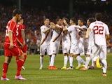 Roma's Marco Borriello reacts after scoring in the 90th minute during a friendly soccer match between Liverpool and Roma at Fenway Park, July 23, 2014
