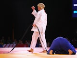 Sarah Adlington of Scotland celebrates victory over Jodie Myers of England in the Womens +78kg Judo gold medal final at the Scottish Exhibition and Conference Centre Precinct during day three of the Glasgow 2014 Commonwealth Games on July 26, 2014