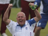 Alex Marshall of Scotland celebrates after winning the Men's Pair Semi-Final match against England at Kelvingrove Lawn Bowls Centre during day four of the Glasgow 2014 Commonwealth Games on July 27, 2014