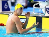 Australia's Thomas Fraser-Holmes celebrates winning gold in the men's 200m freestyle final on July 25, 2014
