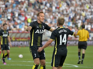 Kane, Lennon fire Spurs to victory
