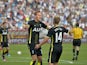 Harry Kane #37 (L) and Lewis Holtby #14 of Tottenham Hotspur celebrate Kane's goal against the Chicago Fire during the first half at Toyota Park on July 26, 2014
