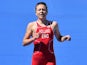England's Vicky Holland finishes third in the women's triathlon on July 24, 2014