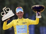 Tour de France 2014's winner Italy's Vincenzo Nibali poses on the podium on the Champs-Elysees avenue in Paris, at the end of the 137.5 km twenty-first and last stage of the 101st edition of the Tour de France cycling race on July 27, 2014