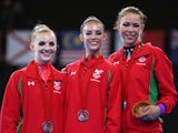  Silver medalists Nikara Jenkins, Laura Halford and Francesca Jones of Wales pose on the podium after coming second in the rhythmic gymnastics team event at the Glasgow Commonwealth Games on July 24, 2014