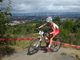 Alice Barnes of England rides in the Women's Cross Country Mountain Biking at Cathkin Braes Mountain Bike Trails during day six of the Glasgow 2014 Commonwealth Games on July 29, 2014