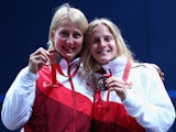 Alison Waters and Emma Beddoes of England celebrate with their bronze medals after the Squash Women's Doubles Final at Scotstoun Sports Campus during day ten of the Glasgow 2014 Commonwealth Games on August 2, 2014