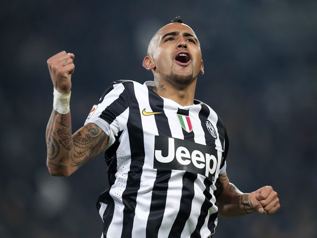 Juventus' midfielder Arturo Vidal celebrates after scoring during the Italian Serie A football match between Juventus and Inter Milan on February 2, 2014