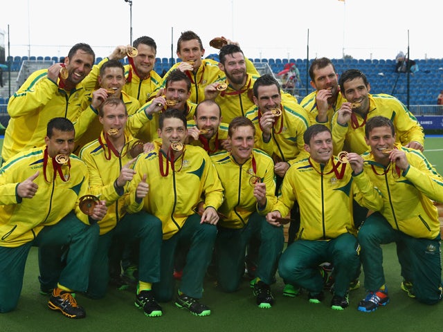 The Australia team celebrate with their Gold Medals after winning the Men's Gold Medal Match Final between India and Australia at Glasgow National Hockey Centre during day eleven of the Glasgow 2014 Commonwealth Games on August 3, 2014