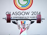 Ben Watson of England lifts during the Men's Weighlifting 75kg Group A Final at Scottish Exhibition And Conference Centre during day seven of the Glasgow 2014 Commonwealth Games on July 30, 2014