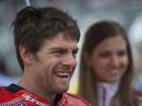 Cal Crutchlow of Great Britain and Ducati team prepares to start on the grid of the MotoGP race during the MotoGp of Germany - Race at Sachsenring Circuit on July 13, 2014