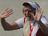 Caroline Povey of England celebrates after winning the bronze medal in the Trap Women's Final on July 28, 2014