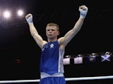 Charlie Flynn of Scotland celebrates after winning the Men's Light 60kg Semi-Finals Boxing at Scottish Exhibition And Conference Centre during day nine of the Glasgow 2014 Commonwealth Games on August 1, 2014
