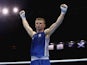 Charlie Flynn of Scotland celebrates after winning the Men's Light 60kg Semi-Finals Boxing at Scottish Exhibition And Conference Centre during day nine of the Glasgow 2014 Commonwealth Games on August 1, 2014