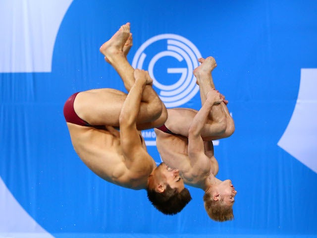 English diving duo Chris Mears and Jack Laugher compete in the synchronised men's 3m springboard final at the Commonwealth Games on August 1, 2014