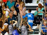 Cyclist Chris Pritchard of Scotland proposes to his partner during competition at the Sir Chris Hoy Velodrome during day four of the Glasgow 2014 Commonwealth Games on July 27, 2014