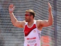 Dan Greaves of England celebrates as he competes in the Men's F42/44 Discus final at Hampden Park Stadium during day five of the Glasgow 2014 Commonwealth Games on July 28, 2014
