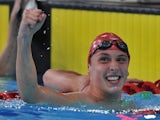 Wales' Daniel Jervis react after taking gold and bronze in the Men's 1500m Freestyle Final on July 29, 2014