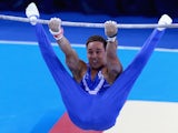 Gymnast Daniel Keatings of Scotland competes on the horizontal bar during the men's Commonwealth Games team final on July 29, 2014