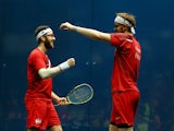 Daryl Selby and James Willstrop of England celebrate victory in the Men's Doubles Bronze Medal Match against Alan Clyne and Harry Leitch of Scotland at Scotstoun Sports Campus during day eleven of the Glasgow 2014 Commonwealth Games on August 3, 2014