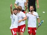 Adam Dixon of Engalnd celebrates after scoring a goal during the men's preliminaries match between New Zealand and England at the Glasgow National Hockey Centre during day six of the Glasgow 2014 Commonwealth Games on July 29, 2014