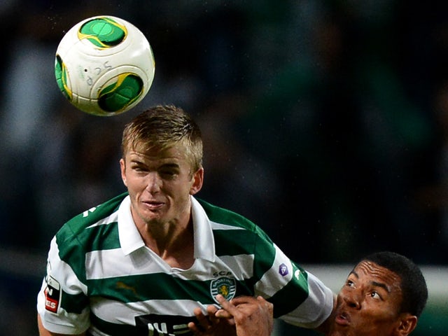 Sporting's English defender Eric Dier vies with Maritimo's Brazilian forward Derley during the Portuguese league football match Sporting CP vs SC Maritimo at Jose Alvalade stadium in Lisbon on November 2, 2013