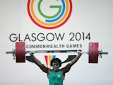 Francois Etoundi of Australia competes on his way to winning bronze in the Men's Weightlifting 77kg category at Scottish Exhibition And Conference Centre during day four of the Glasgow 2014 Commonwealth Games on July 27, 2014