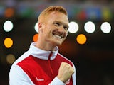 Gold medallist Greg Rutherford of England poses on the podium during the medal ceremony for the Mens Long Jump at Hampden Park during day seven of the Glasgow 2014 Commonwealth Games on July 30, 2014