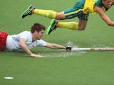 Henry Weir of England reaches for the ball in the Men's Semi-Final match between Australia and England at Glasgow National Hockey Centre during day ten of the Glasgow 2014 Commonwealth Games on August 2, 2014