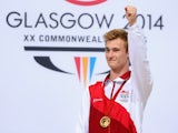 England's Jack Laugher with his Commonwealth Games gold medal after winning the men's 1m springboard final at the Royal Commonwealth Pool in Edinburgh on July 30, 2014