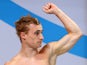 Jack Laugher of England celebrates after winning the gold medal in the Men's 1m Springboard Final at Royal Commonwealth Pool during day seven of the Glasgow 2014 Commonwealth Games on July 30, 2014
