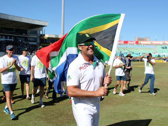 South Africa's Jacques Kallis celebrates his team's victory on the fifth day of the second and final Test between South Africa and India at Kingsmead on December 30 , 2013