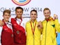 James Denny and Tom Daley of England pose with their silver medals next to gold medallists Domonic Bedggood and Matthew Mitcham of Australia after the men's synchronised 10m platform final at the Commonwealth Games on August 1, 2014