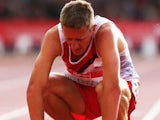 James Wilkinson has a little rest after the men's 3000m steeplechase on August 1, 2014