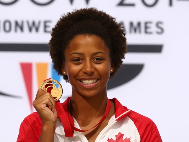 Gold medalist Jennifer Abel of Canada poses during the medal ceremony for the Women's 1m Springboard Final at Royal Commonwealth Pool during day nine of the Glasgow 2014 Commonwealth Games on August 1, 2014