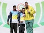 Silver Medalist Gurpal Singh of India, Gold Medalist Jitu Rai of India and Bronze Medalist Daniel Repacholi of Australia celebrate on the podium during Men's 50m Pistol Shooting Final at Barry Buddon Shooting Centre during day five of the Glasgow 2014 Com