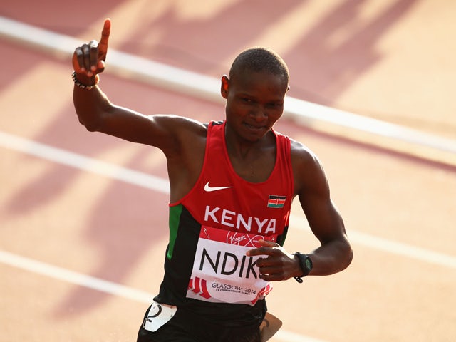 Jonathan Ndiku of Kenya crosses the line to win gold in the Men's 3000 metres Steeplechase final at Hampden Park during day nine of the Glasgow 2014 Commonwealth Games on August 1, 2014