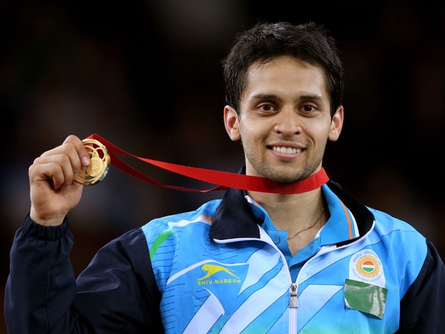 Gold medalist Kashyap Parupalli of India poses in the medal ceremony for the Men's Singles Gold Medal Match at Emirates Arena during day eleven of the Glasgow 2014 Commonwealth Games on August 3, 2014
