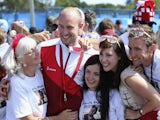 Kenneth Parr of England celebrates with family and friends after winning the bronze medal during the Men's 50m Rifle Prone Shooting on July 28, 2014