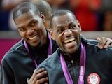 Gold medallists Kevin Durant #5 of the United States, and LeBron James #6 of the United States celebrate on the podium on August 12, 2012