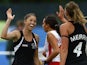 Krystal Forgesson of New Zealand celebrates with Olivia Merry after scoring a goal during the Women's preliminaries match between New Zealand and Canada at Glasgow National Hockey Centre during day seven of the Glasgow 2014 Commonwealth Games on July 30, 