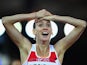 England's Laura Weightman celebrates winning silver in the women's 1500m on July 29, 2014