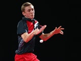 Liam Pitchford of England in action during the singles match between Ning Gao of Singapore and Liam Pitchford of England in the Men's Team Table Tennis Final between Singapore and England at Scotstoun Sports Campus during day five of the Glasgow 2014 Comm