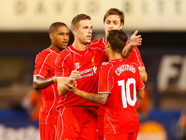 Jordan Henderson #14 of Liverpool celebrates scoring a goal in the 59th minute against Manchester City during the International Champions Cup 2014 at Yankee Stadium on July 30, 2014