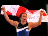 Louisa Porogovska of England celebrates after winning the bronze medal in the Women's FS 55kg at Scottish Exhibition and Conference Centre during day eight of the Glasgow 2014 Commonwealth Games on July 31, 2014