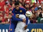 Manchester United's Chris Smalling vies with Inter Milan's Mauro Icardi during a Champions Cup match at FedEx Field in Landover, Maryland, on July 29, 2014