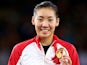 Gold medalist Michelle Li of Canada poses in the medal ceremony for the Women's Singles Gold Medal Match at Emirates Arena during day eleven of the Glasgow 2014 Commonwealth Games on August 3, 2014
