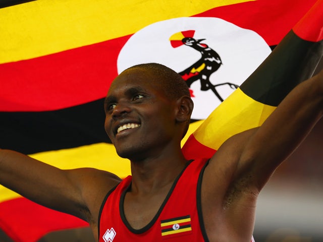 Moses Kipsiro of Uganda celebrates winning gold in the Men's 10,000 metres final at Hampden Park during day nine of the Glasgow 2014 Commonwealth Games on August 1, 2014