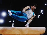 Australia's Naoya Tsukahara competes on the pommel horse during day one of the men's team final at Glasgow's SSE Hydro on July 28, 2014